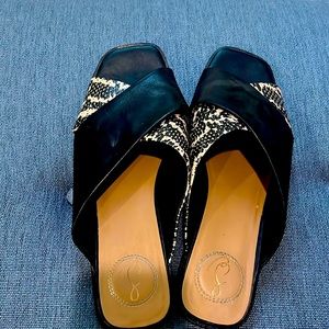 Black and cream and black slides.  Great for upcoming summer season